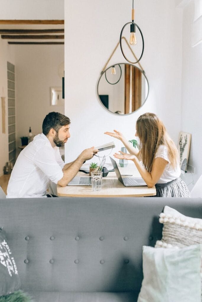 Man and Woman Discussing Work